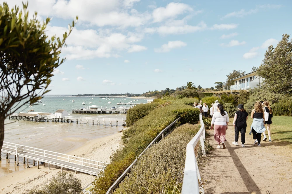 People walking along seaside