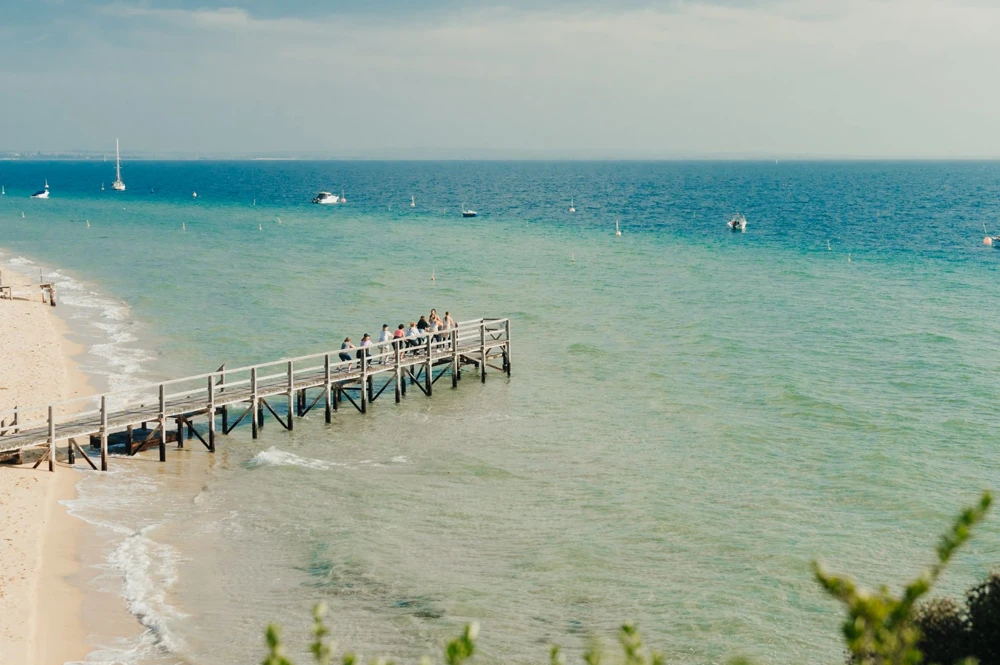 People on Sorrento pier enjoying Aurora Retreat